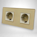 Priză dublă cu ramă din sticlă aurie – priză Schuko modernă cu design premium pentru interior
